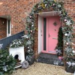Pink front door with Christmas Wreaths
